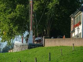 grieth village at the river rhine photo