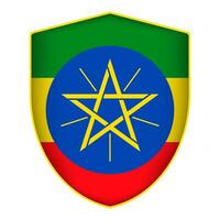 Ethiopia flag in shield shape. Vector illustration.