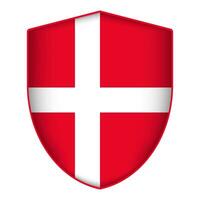 Denmark flag in shield shape. Vector illustration.