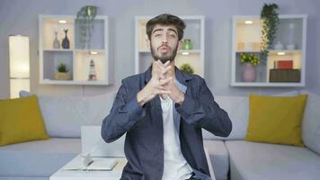 Man looking at camera making confidence sign. video