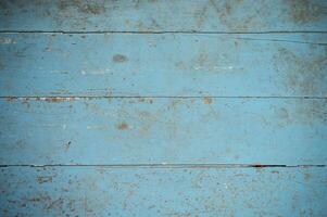 Close up texture of old blue wooden background photo