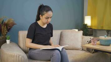 The cowardly woman who thinks she hears a voice while reading a book. video