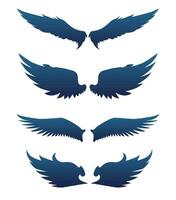 A set of silhouettes of paired wings vector