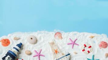 Top view of summer beach decoration on blue background, copy space for text photo