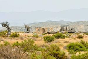 an old abandoned building in the desert photo