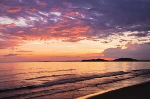 View of sea with sunset sky for nature background photo