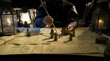 The commander is working on the map with an arrow in his hand. Historical background. video