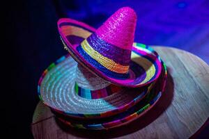 Mexican sombrero hat in the decor of the hall for the holiday. Mexican style party. photo