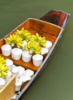 Tropical fruits for sale on floating market photo