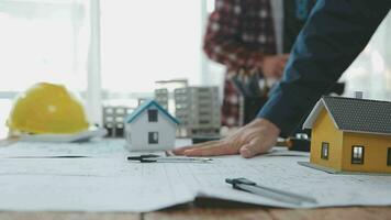 Architectural engineer team meeting Use of blueprints, construction drawings and calculations for architectural projects and engineering tools in the workplace technical structure concept. video