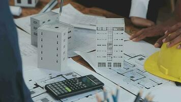 Architectural engineer team meeting Use of blueprints, construction drawings and calculations for architectural projects and engineering tools in the workplace technical structure concept. video