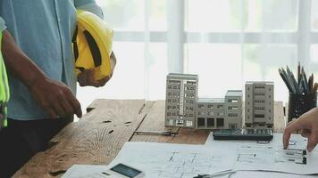 Architectural engineer team meeting Use of blueprints, construction drawings and calculations for architectural projects and engineering tools in the workplace technical structure concept. video