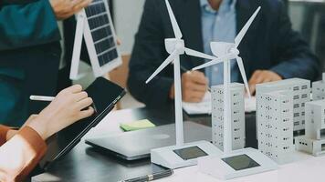 Business team people meeting and talking with engineer and architecture about planning and drawing of building construction project, smart executive professional working at outdoor, teamwork concept video