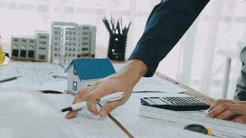 Architectural engineer team meeting Use of blueprints, construction drawings and calculations for architectural projects and engineering tools in the workplace technical structure concept. video