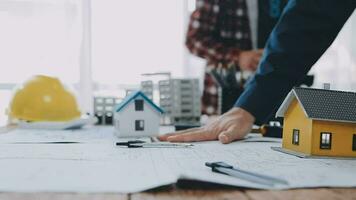 Architectural engineer team meeting Use of blueprints, construction drawings and calculations for architectural projects and engineering tools in the workplace technical structure concept. video