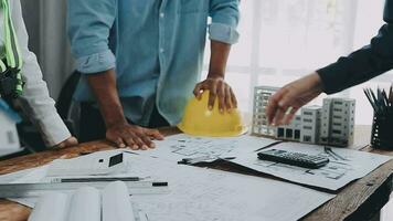 Architectural engineer team meeting Use of blueprints, construction drawings and calculations for architectural projects and engineering tools in the workplace technical structure concept. video