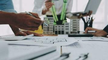 Architectural engineer team meeting Use of blueprints, construction drawings and calculations for architectural projects and engineering tools in the workplace technical structure concept. video