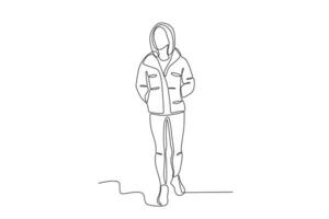 A beautiful woman wearing a thick down jacket vector