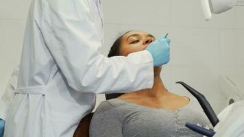 Gorgeous happy woman smiling after dental checkup video