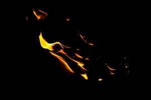 Fire flame texture. Burning material backdrop. Burn effect pattern. Blaze and torch wallpaper. Heat and haze backdrop. photo