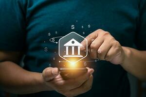 Businessman using mobile online banking and payments, digital marketing. Financial and banking networking. Customer network connection and online shopping icons cyber security, business technology photo