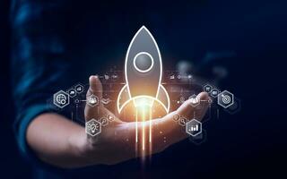 Startup business concept, rocket is launching and flying from hand to sky for growing business, fast business success. startup founder, network connection, idea generation, digital marketing photo