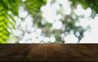 Wood Table Top in Blur Background room interior with empty copy space. photo