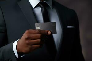 Businessman holding credit card on dark background, closeup. Online shopping. Generative AI photo