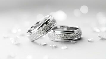 Wedding rings on a white background with sparkles and stars.  Generative AI photo