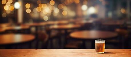 The restaurant blurred in the background with a table top in front photo