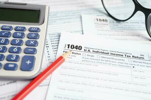 Tax form 1040 U.S. Individual Income Tax Return, business finance concept. photo