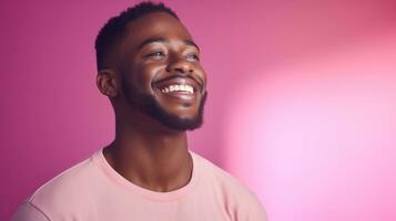 Portrait of a smiling young african american man on pink neon light background with copyspace AI Generated photo