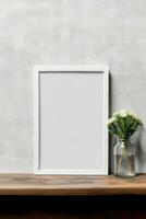 Blank vertical picture frame mockup hanging on a plain wall with wooden desk table and flower vase AI Generated photo