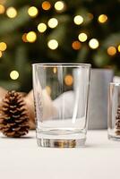 Blank Glass Shot for alcoholic drinks with blur christmas background mockup AI Generated photo
