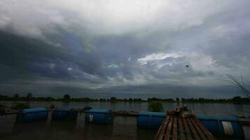 Panorama with cloudy sky over the raft on the River. Cloudy Sky Over The River. video