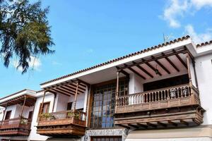 a building with wooden balconies photo