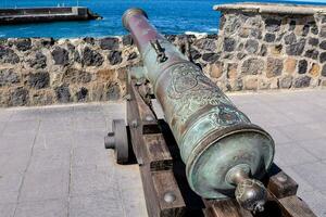 a cannon on display at the fort of san juan photo