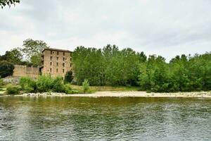 Building by the river photo