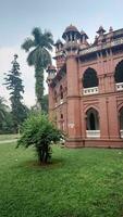 Dhaka University is located in Dhaka, Bangladesh. Aparajeyo Bangla is a sculpture commemorating the 1971 Bangladesh Liberation War. It is situated on the Dhaka University campus. photo