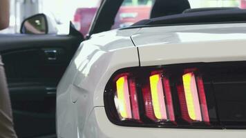 Close up of car lights flashing on a new convertible video