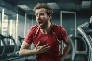 Young man having heart attack emergency in gym. Generate Ai photo