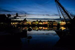 the lights of the harbor at night photo