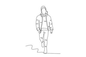 A man walking in winter clothes vector