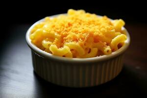 Macaroni and cheese in a bowl on a wooden table AI Generated photo