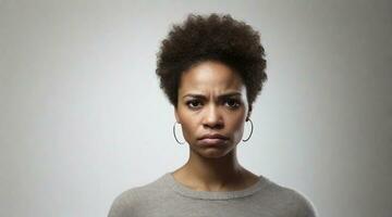 Portrait of an afro-american woman with a deep sad expression  against white background, background image, AI generated photo