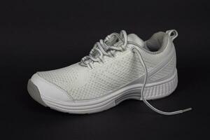 Super New practical beautiful White sneakers of the elite manufacturer of high quality. photo