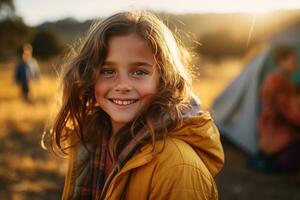 Portrait of cute little girl at camera while standing near camping tent at sunset AI generated photo