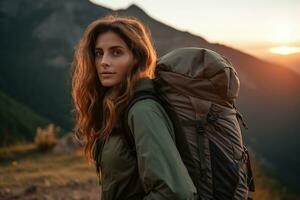 Beautiful woman hiker with backpack hiking in the mountains at sunset AI generated photo