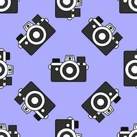 Seamless pattern vintage black camera drawn in doodle style on a purple background. Cute background, retro element, wrapping paper. vector