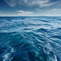 Image in open sea, blue water, sky, clouds photo
